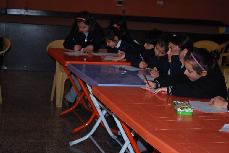 Suleimaniah Students Prepare Presentation on Television